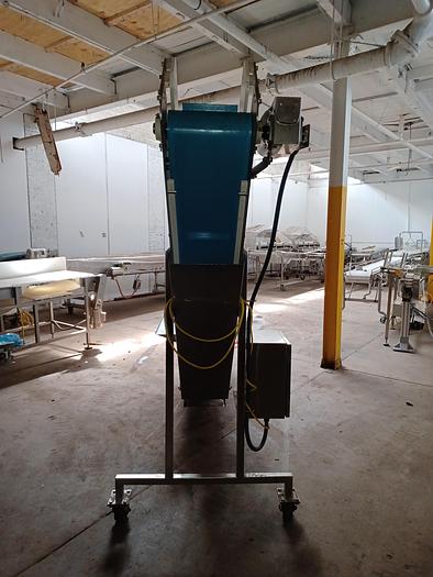 Used Stainless incline conveyor 11' long 12" wide discharge end 6' tall indeed 30" tall 