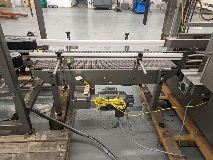 Used Combi Alphapack Case Packer and sealer (Never used) New 2019