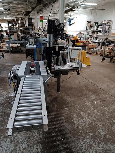 Used Belcor Model 130 Top and bottom case sealer taper with labeler