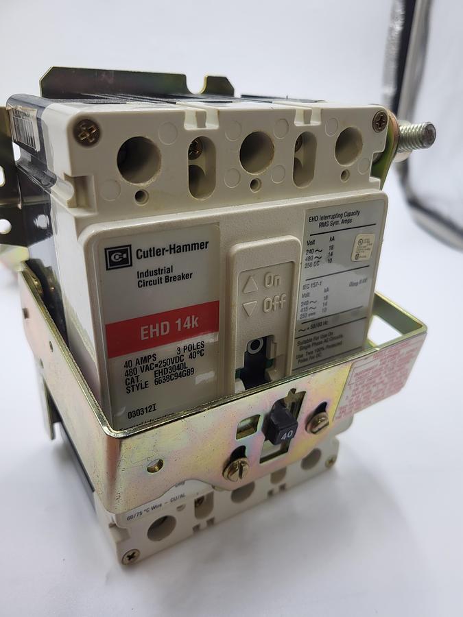 Used Cutler Hammer EHD 14K 40 amp circuit breaker & Allen Bradley On/Off disconnect switch arm 1494V-M40
