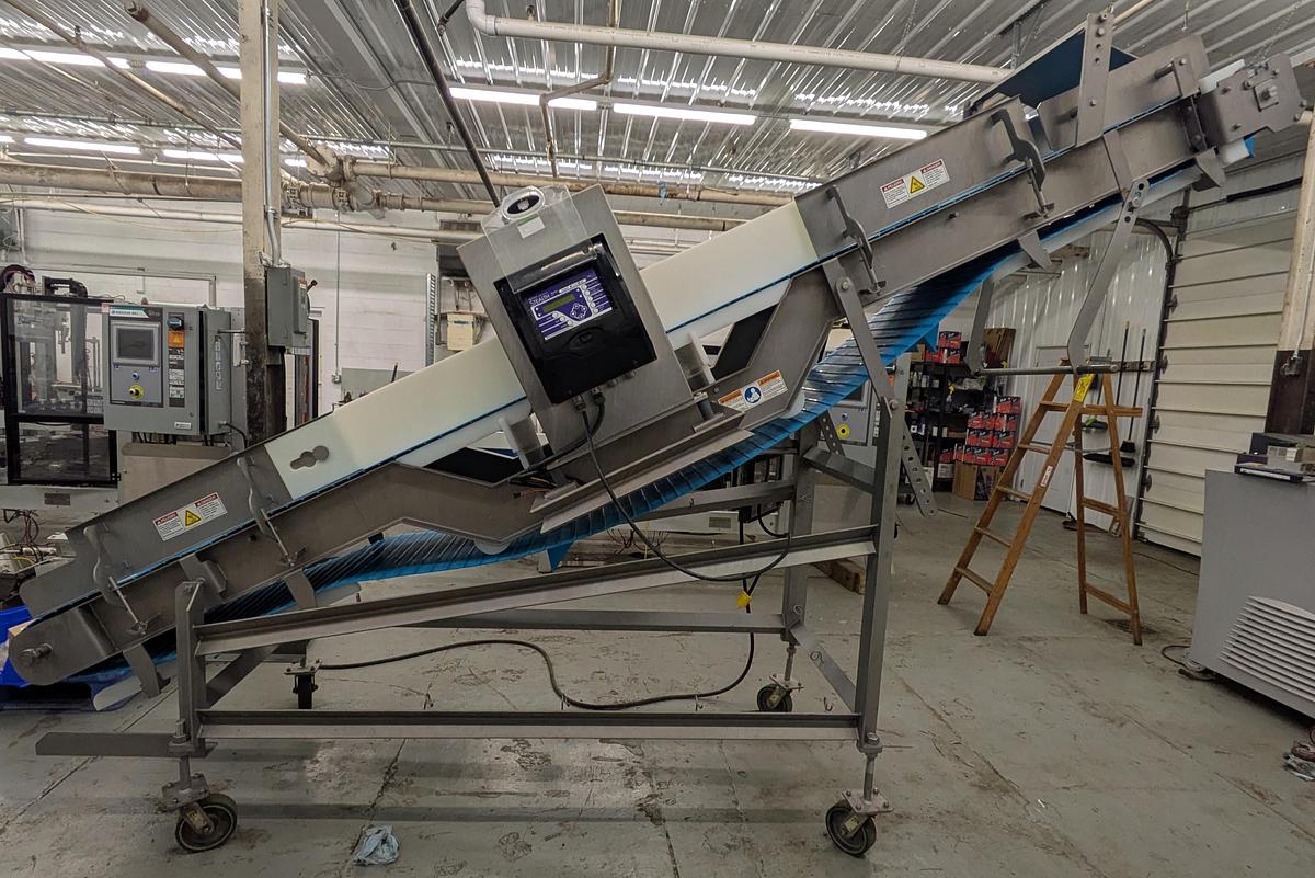 Used fortress Stealth metal detector with Weiler conveyor system