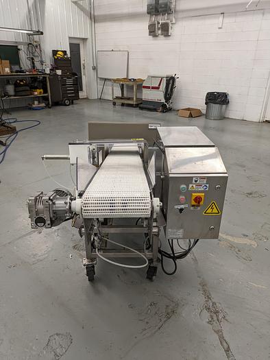 Used Fortress Stealth metal detector, Satinless steel conveyor ( food grade)