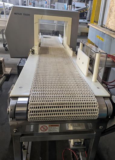 Used Safeline metal detector, 12 1/4" tall x 13 3/4" wide, Stainless conveyor, pne2013umatic reject