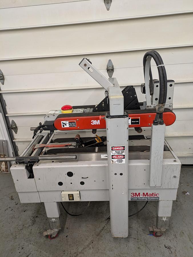 Used 3m 700R random case sealer with top and bottom tape heads