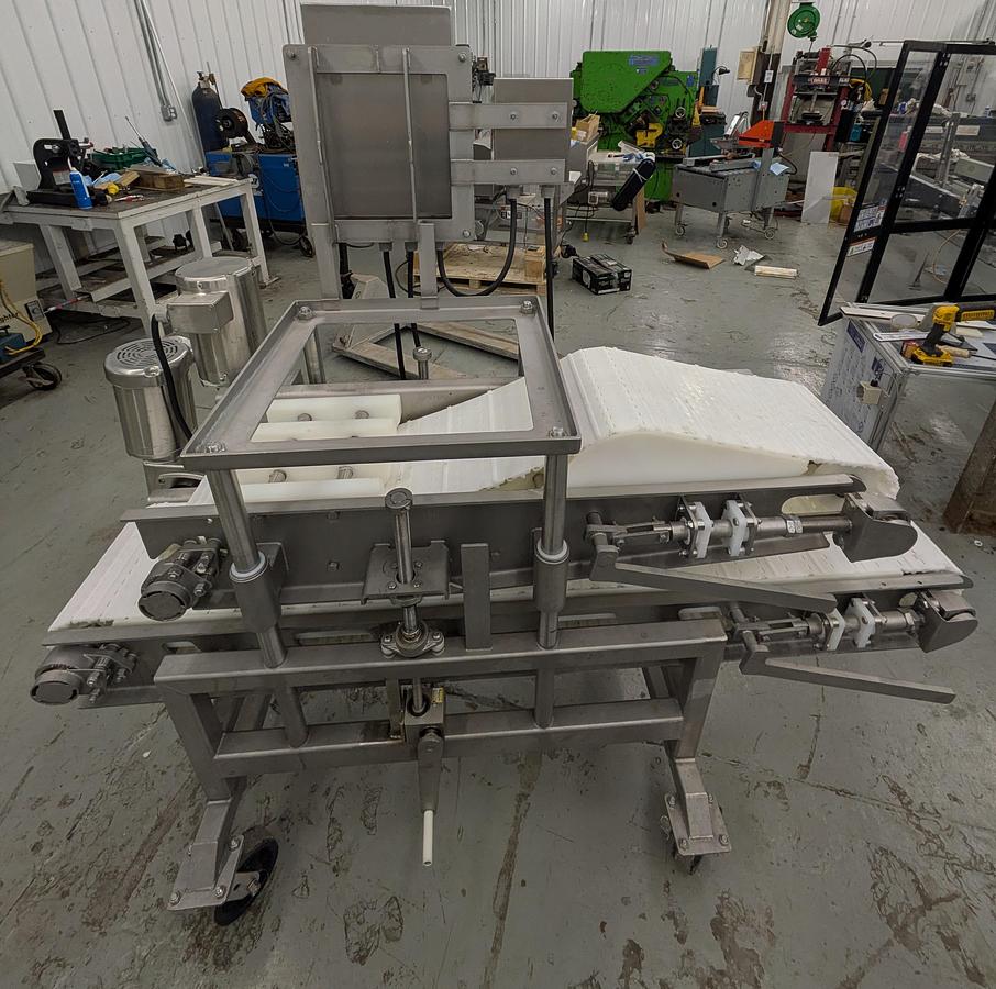 Used Friesens flattening conveyor, stainless