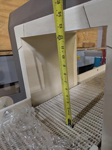 Used Safeline metal detector, 12 1/4" tall x 13 3/4" wide, Stainless conveyor, pne2013umatic reject