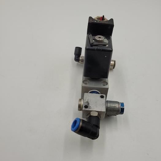 Used Festo MSG-24DC Solenoid Coil connected to Festo MC-2-1/8 Valve