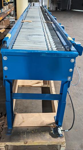 Roach powered roller conveyor