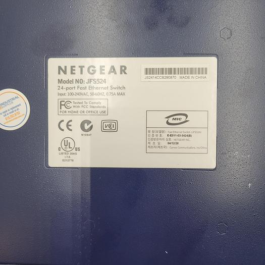 Used NETGEAR JFS524 — 24 Port 10/100 Fast Ethernet Unmanaged Switch with hanging bracket
