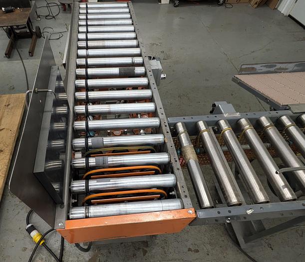 Used roller conveyor, 90 degree transition, pack station