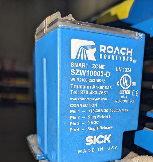 Roach powered roller conveyor