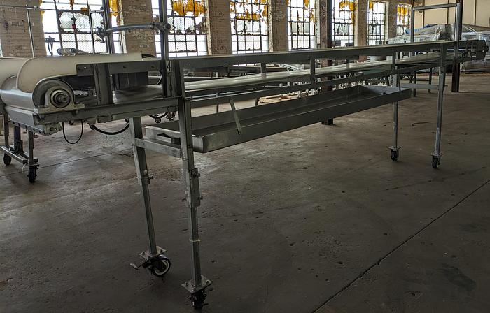 Used stainless conveyor 18" wide 17'6" long, white pvc belting, adjustable legs, casters