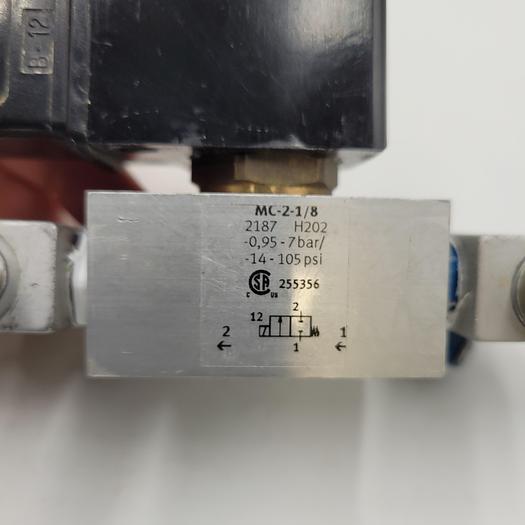 Used Festo MSG-24DC Solenoid Coil connected to Festo MC-2-1/8 Valve