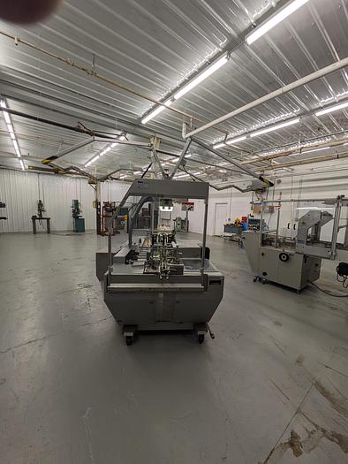 Used PMM intermittent motion horizontal cartoner