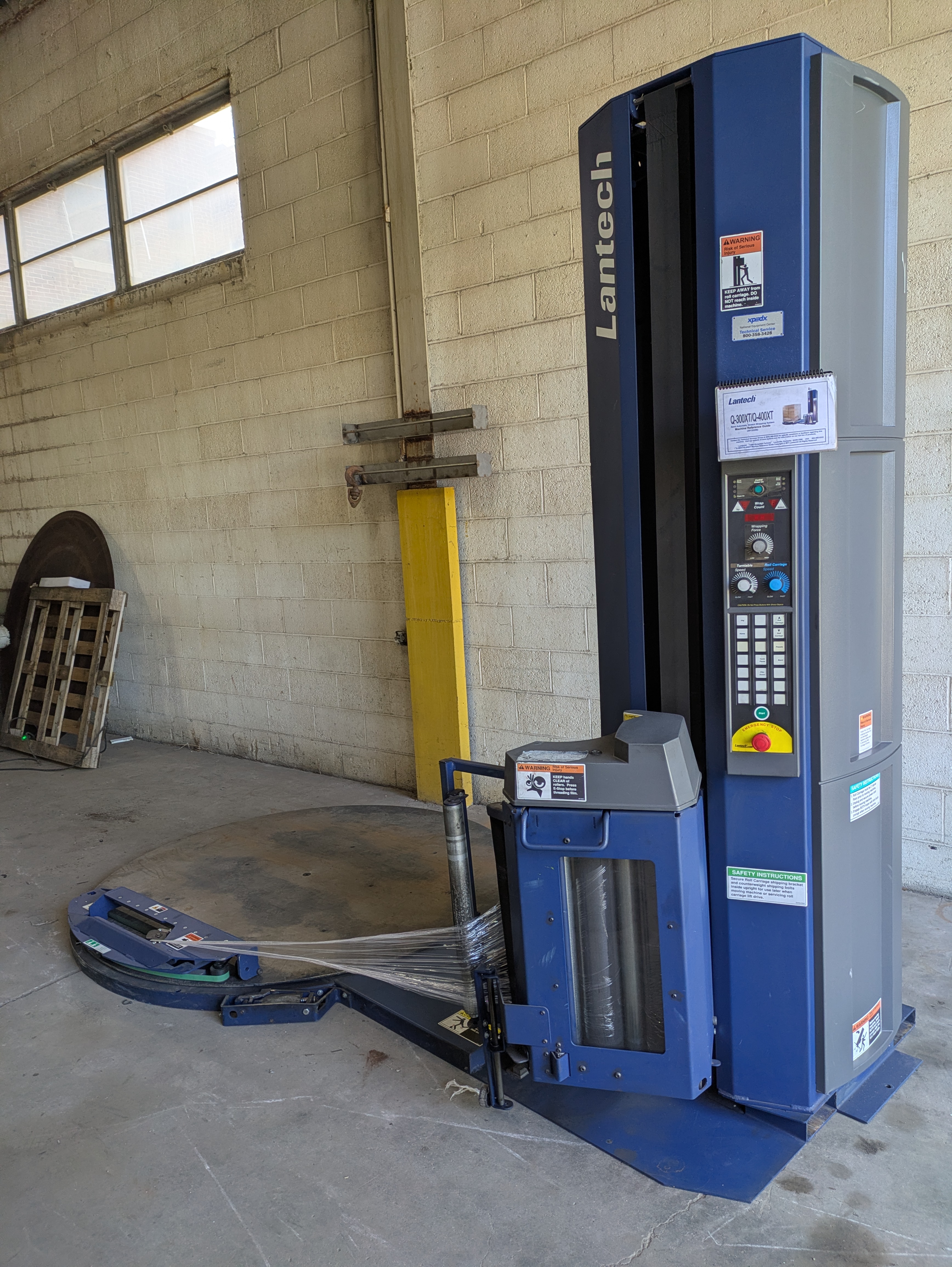 Used Lantech Q300XT stretch wrapper with cut and clamp