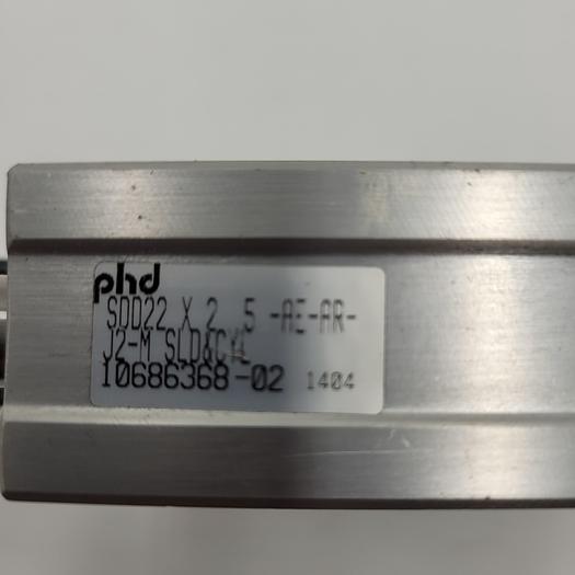 Used PHD SDD22 X 2 5-RER-PR-J2-M-H4 PNEUMATIC CYLINDER CONNECTED TO PHD FRAME SDD22X2 5-AE-PR-J2-M