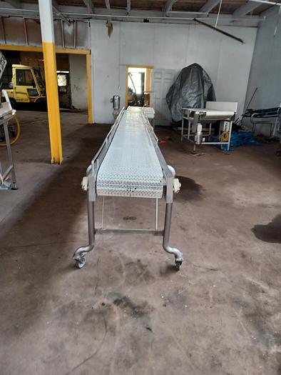 Used Stainless Steel plastic belt conveyor 18' long 36" wide 38" tall on wheels