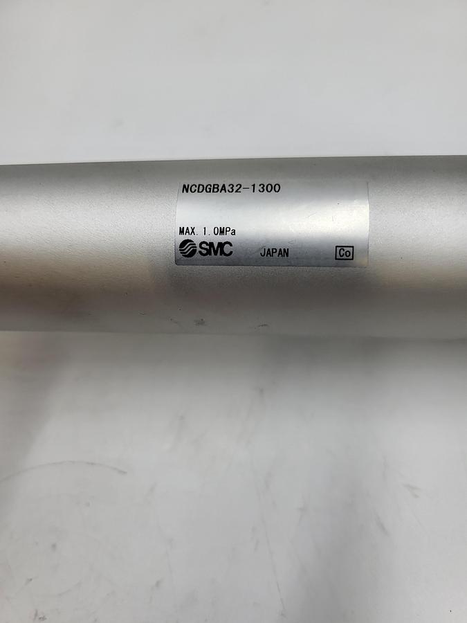 Used SMC CYLINDERS NCDGBA32-1300 Cylinder, 1.25 in. Bore, 3 in. Stroke, Double Acting & 3G1-44C floating joint & mounting plate