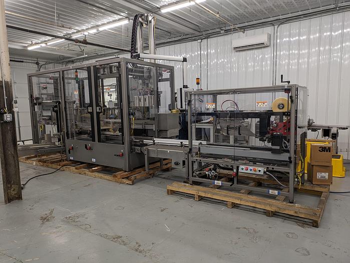 Used Combi Alphapack Case Packer and sealer (Never used) New 2019