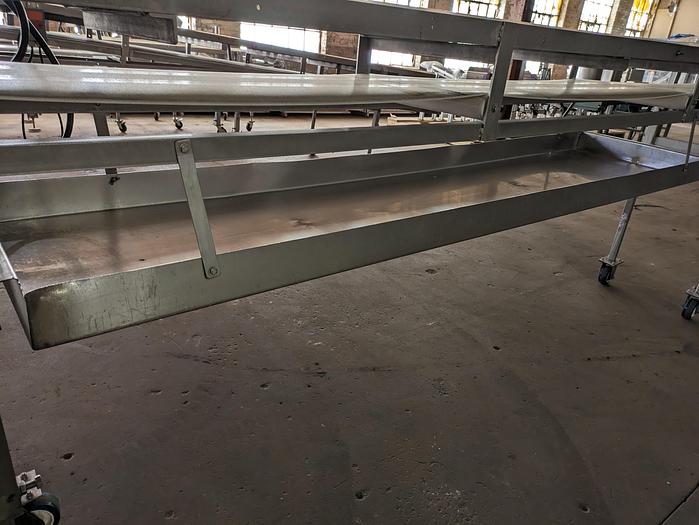 Used stainless conveyor 18" wide 17'6" long, white pvc belting, adjustable legs, casters