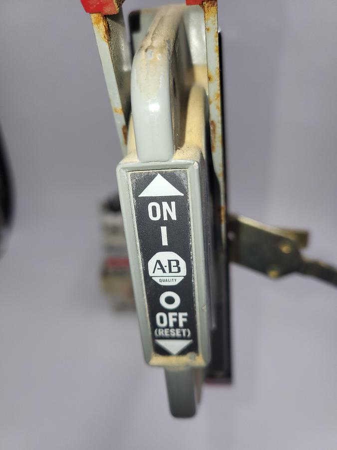 Used Cutler Hammer EHD 14K 40 amp circuit breaker & Allen Bradley On/Off disconnect switch arm 1494V-M40