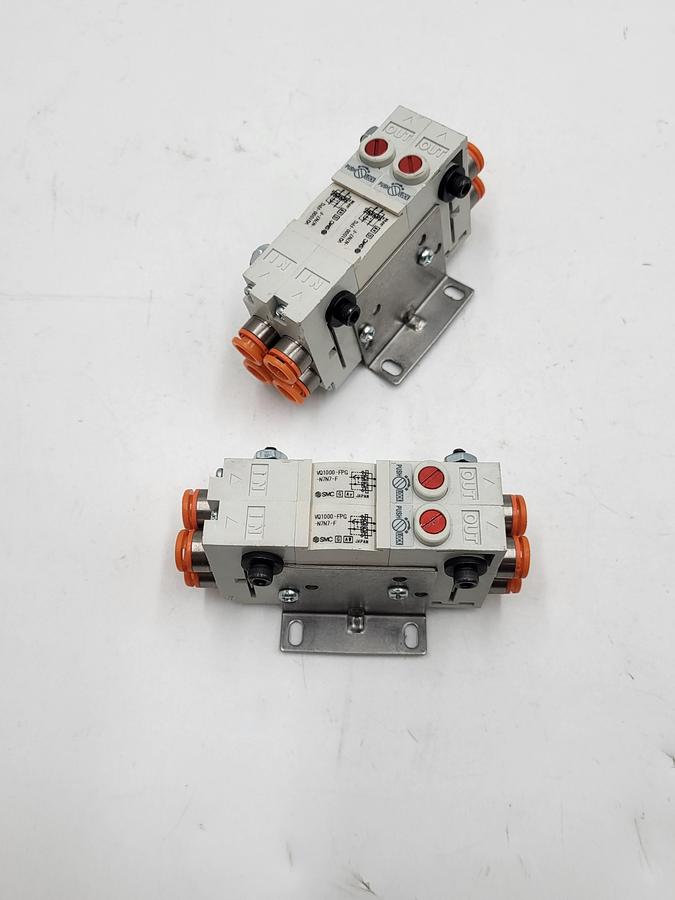 Used SMC Corporation VQ1000-FPG-N7N7-F Perfect Check TWO Blocks merged & mounted on bracket