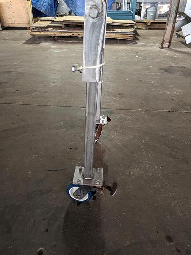 Used stainless conveyor 18" wide 17'6" long, white pvc belting, adjustable legs, casters