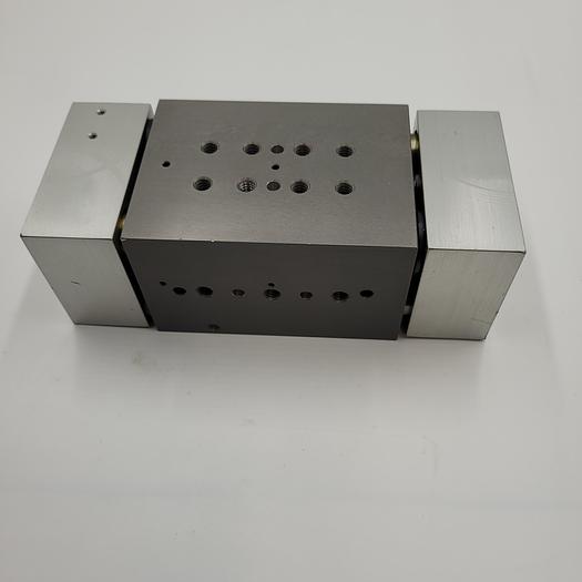 Used GRW WIDE BODY PNEUMATIC PARALLEL GRIPPER PHD GRW3-1-32 X 65-Z1 11482084-01 - Corrosion resistant coating on exposed ferrous parts except for jaw guides.