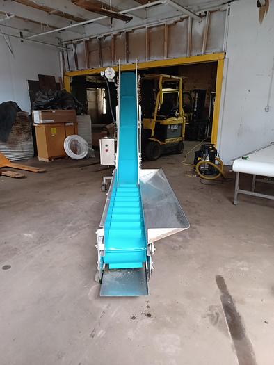 Used Stainless incline conveyor 11' long 12" wide discharge end 6' tall indeed 30" tall 