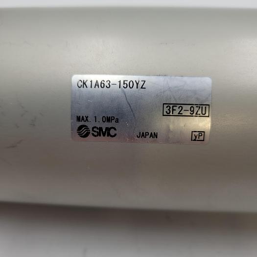 Used SMC CK1A63-150YZ pneumatic cylinder w/ piston yoke attachment
