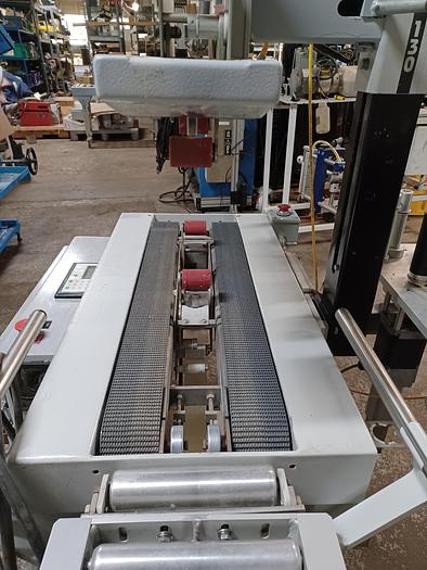 Used Belcor Model 130 Top and bottom case sealer taper with labeler