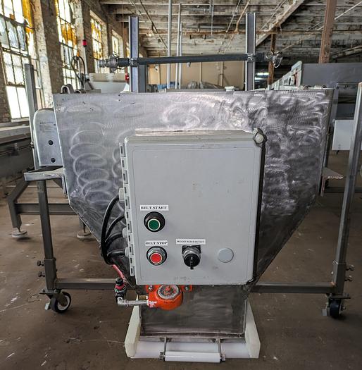 Used conveyor, stainless steel frame, 18" wide 21' long PVC belt adjustable leg with casters.