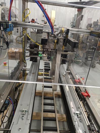 Used Combi Alphapack Case Packer and sealer (Never used) New 2019