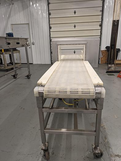 Used Safeline metal detector 17-1/2" wide x 11-3/4" tall. conveyor 16" wide x 100" long. 32" tal