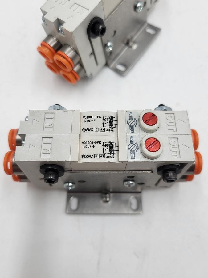 Used SMC Corporation VQ1000-FPG-N7N7-F Perfect Check TWO Blocks merged & mounted on bracket