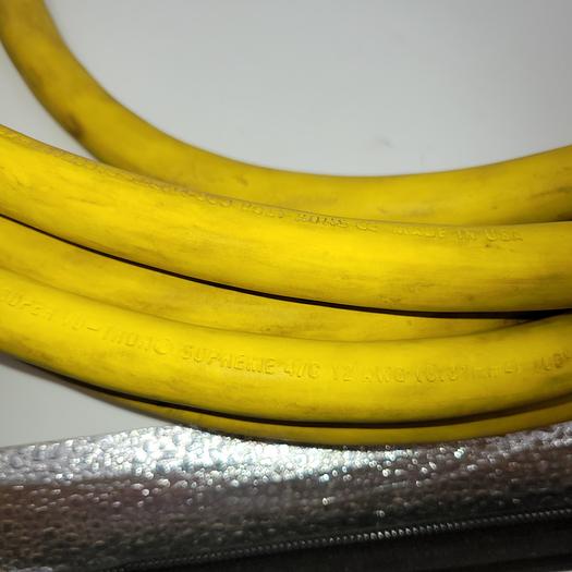 Used Meltric DSN20 / 63-18043 male end & DSN20 / 63-14043 female end connected with 25' super Vu-Tron 4/c 12AWG SOOW