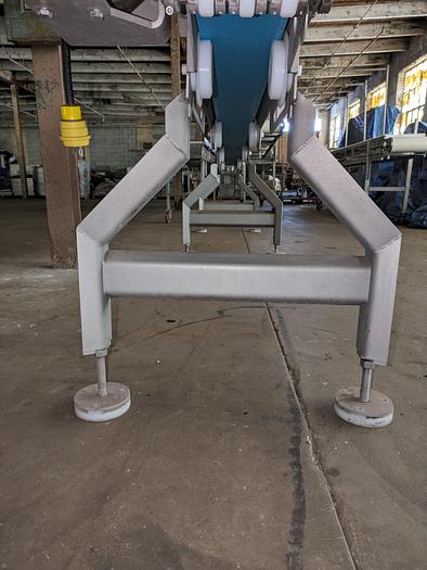 Used conveyor, stainless steel frame, 6" wide 15' long intralox belt adjustable feet flip up rails