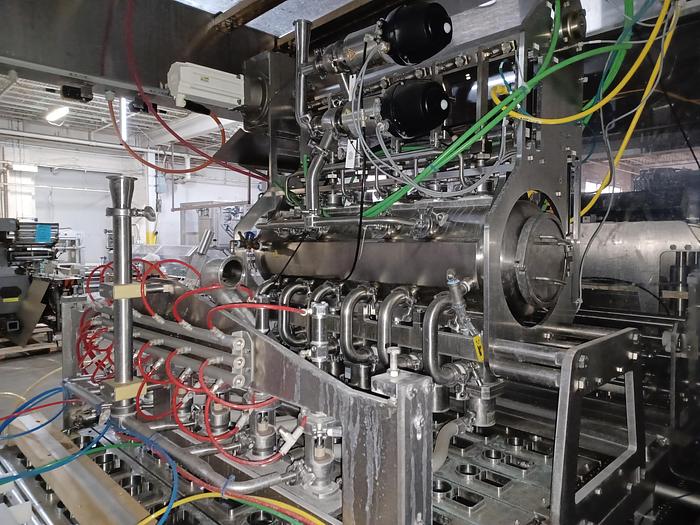 Used RA JONES Autoprod CF-840 Inline indexing filler, sealer and/or overcapper