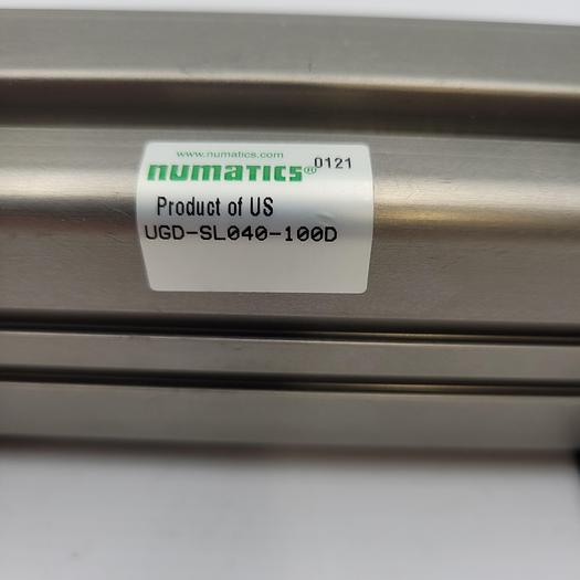 Used NUMATICS PNEUMATIC CYLINDER UGD-SL040-100D WITH A BRACKET