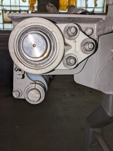 Used conveyor, stainless steel frame, 6" wide 15' long intralox belt adjustable feet flip up rails