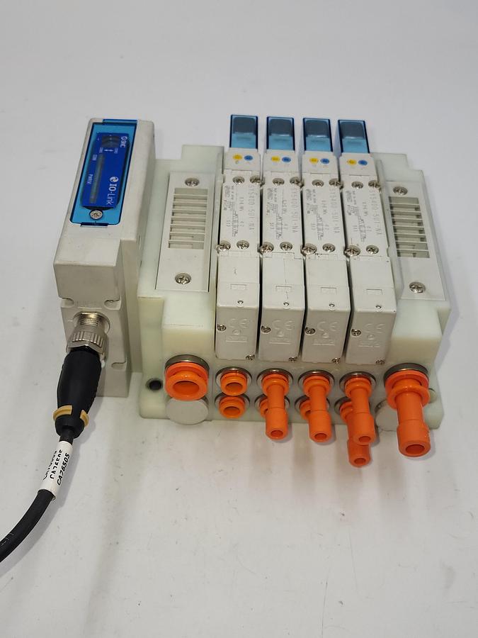 Used SMC SY5-IOL-0-N74RI W/ 4 solenoids SY5400 / One: EX260-SIL1 Serial Transmission System