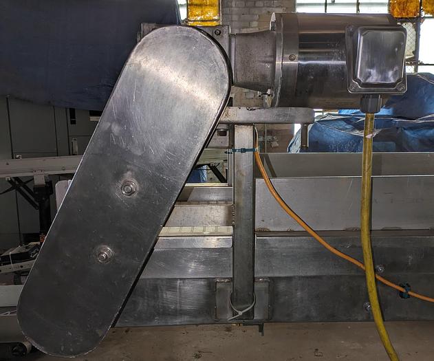 Used conveyor, stainless steel frame, 19" wide 20' long plastic modular belt adjustable leg with casters.