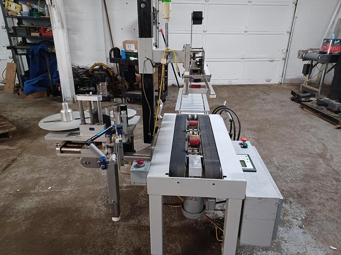 Used Belcor Model 130 Top and bottom case sealer taper with labeler