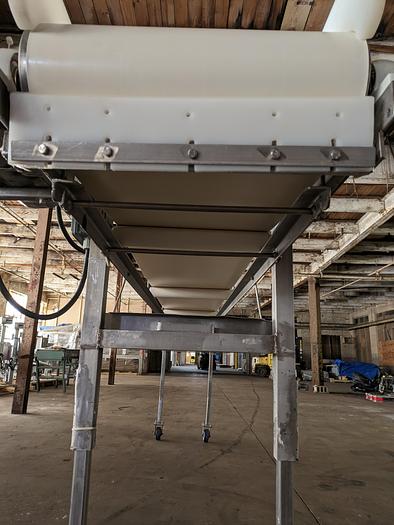 Used stainless conveyor 18" wide 17'6" long, white pvc belting, adjustable legs, casters
