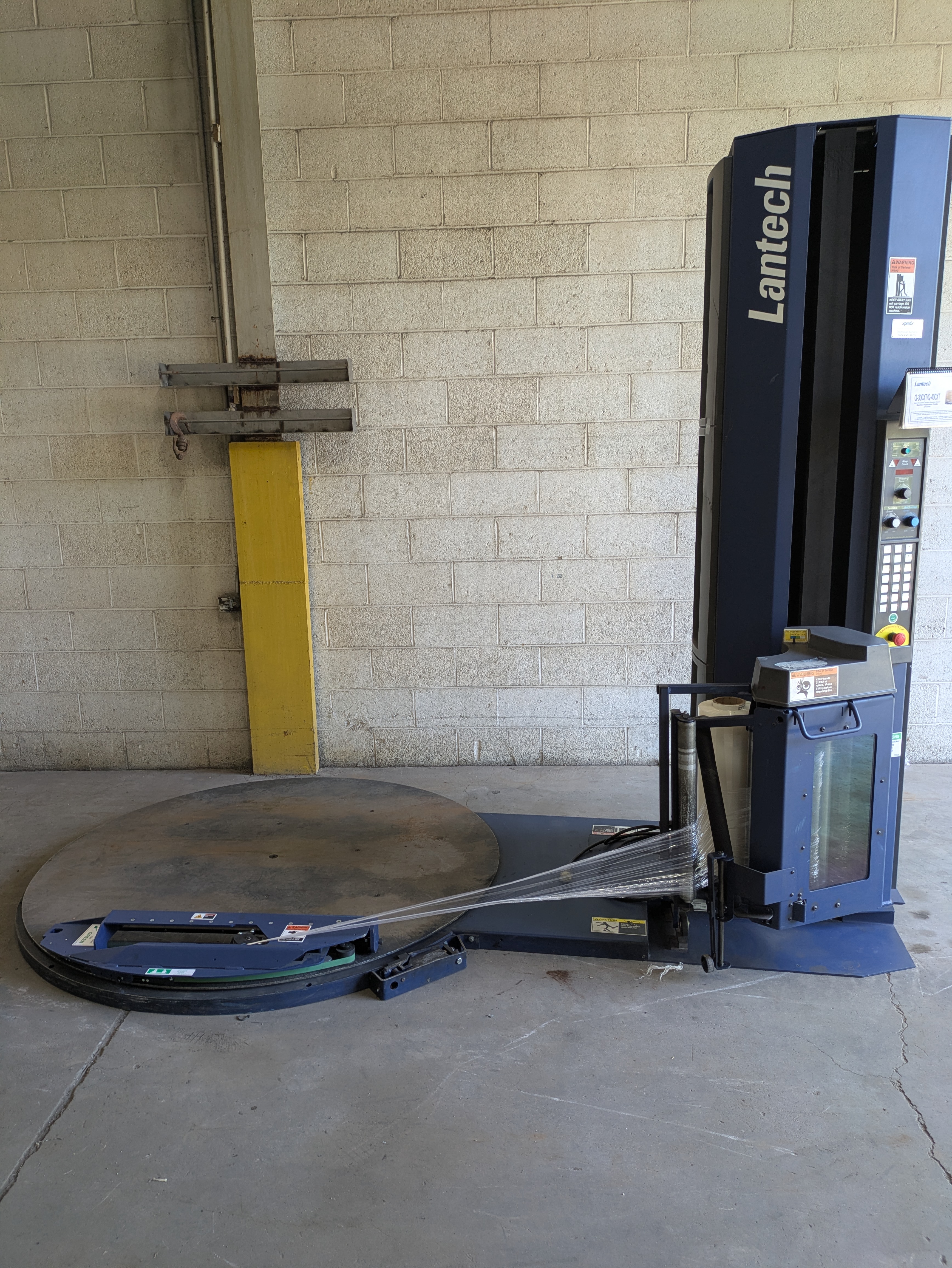 Used Lantech Q300XT stretch wrapper with cut and clamp