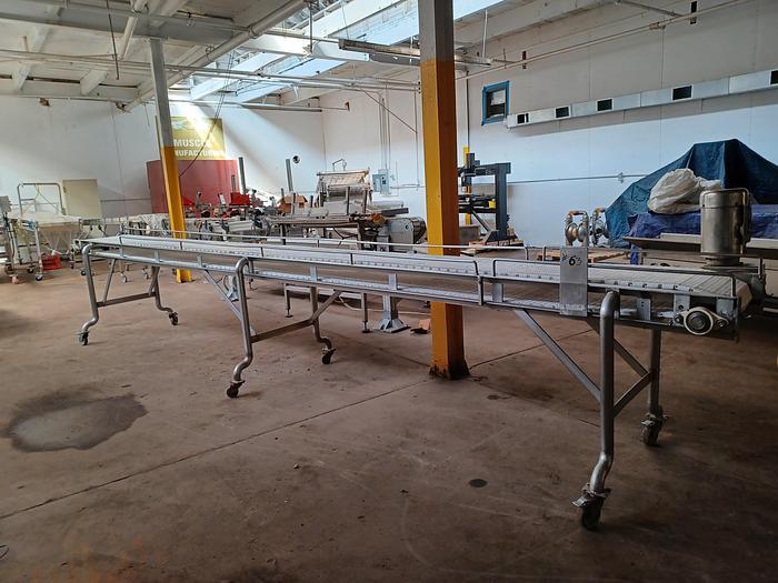 Used Stainless Steel plastic belt conveyor 18' long 36" wide 38" tall on wheels
