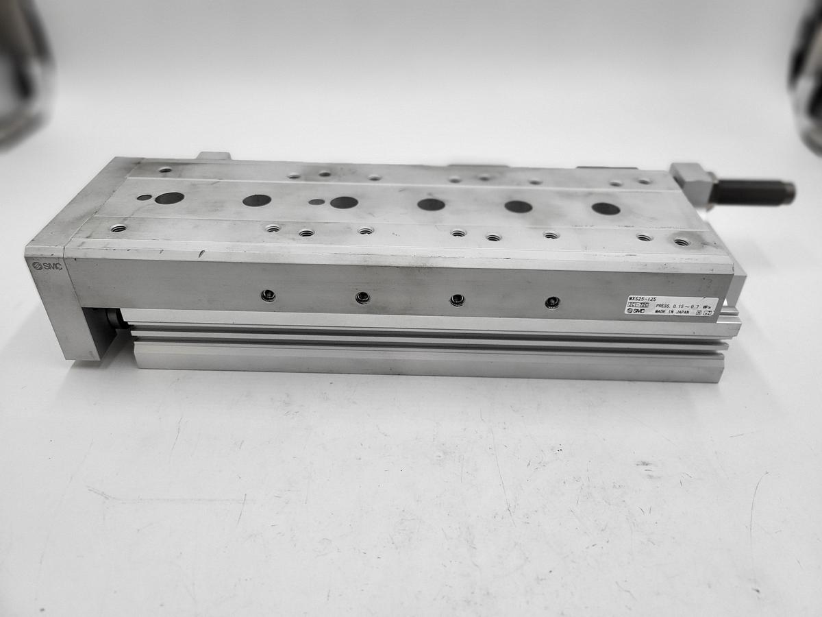 Used SMC MXS25-125 Pneumatic cylinder table