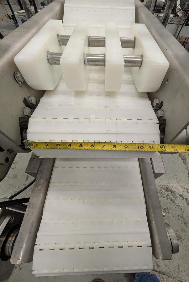 Used Friesens flattening conveyor, stainless