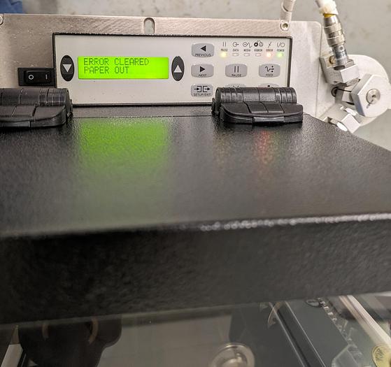 Used label printer, applicator, adjustable stand