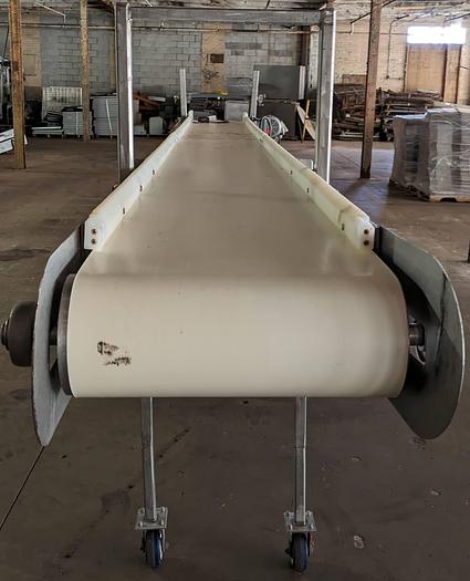 Used stainless conveyor 18" wide 17'6" long, white pvc belting, adjustable legs, casters